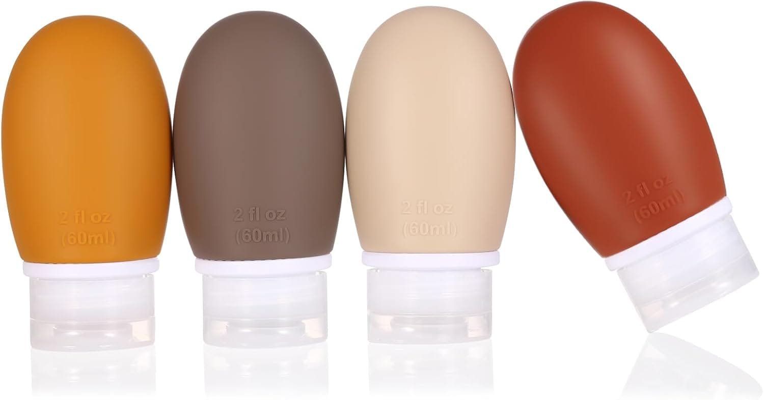 Botellas de Viaje,4 paquete 60ml silicona Botella de viaje a prueba de fugas exprimiendo portátiles contenedores recipientes para champús,lociones y artículos de tocador